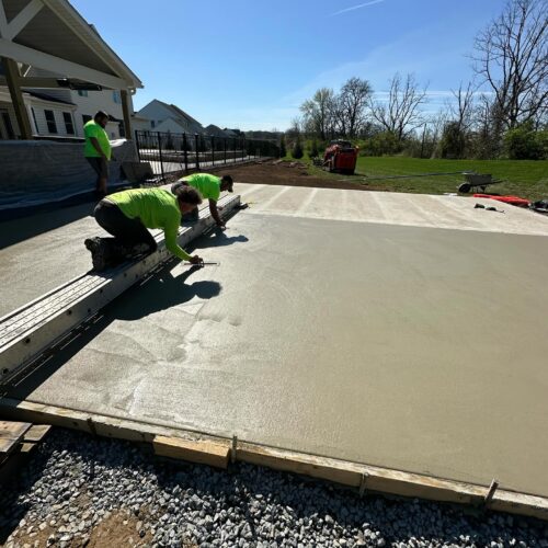Spayd's Team laying concrete for basketball court